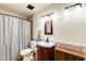 Traditional bathroom featuring a vanity, toilet, and shower/tub combination at 7253 S Terrace Rd, Tempe, AZ 85283