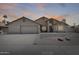 Charming single-story home featuring desert landscaping and a two-car garage at 7253 S Terrace Rd, Tempe, AZ 85283