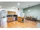 Bright kitchen area featuring tile countertops, stainless steel appliances and an adjoining dining area at 7253 S Terrace Rd, Tempe, AZ 85283