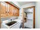 Laundry room featuring a washer and dryer, cabinets, and access to the garage at 7253 S Terrace Rd, Tempe, AZ 85283