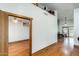 Spacious living room with hardwood floors and access to dining area at 7253 S Terrace Rd, Tempe, AZ 85283