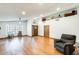Spacious living room with hardwood floors, natural light, fireplace and comfortable seating at 7253 S Terrace Rd, Tempe, AZ 85283