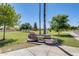 Corbell Park featuring green lawns, mature trees, walkways, and seating, creating a serene outdoor recreational space at 7253 S Terrace Rd, Tempe, AZ 85283