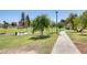Lush community park featuring walking paths, picnic areas, mature trees, and a covered gazebo for outdoor enjoyment at 7253 S Terrace Rd, Tempe, AZ 85283