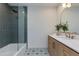 Bathroom features a glass enclosed shower with rain shower head, modern vanity and decorative tile flooring at 7328 E Laredo Ln, Scottsdale, AZ 85250