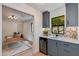 Charming kitchenette featuring a wine cooler, sleek cabinetry, and a stylish backsplash, leading into the office at 7328 E Laredo Ln, Scottsdale, AZ 85250