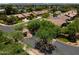 Aerial shot of a residential community with lush landscaping and well-maintained streets at 8036 E Mercer Ln, Scottsdale, AZ 85260