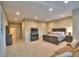 Large main bedroom with neutral decor, wood furniture, recessed lighting, and a comfortable seating area at 8036 E Mercer Ln, Scottsdale, AZ 85260