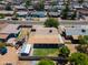 Aerial view of home with large backyard, covered patio, and convenient storage shed at 8132 W Pierson St, Phoenix, AZ 85033