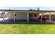 Enjoy the large covered patio and grassy yard perfect for outdoor living and entertaining at 8132 W Pierson St, Phoenix, AZ 85033