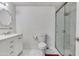 Bright bathroom with vanity, decorative mirror, and walk-in shower at 8132 W Pierson St, Phoenix, AZ 85033