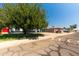 A well-maintained single-story home with mature landscaping and a clear view of the neighborhood at 8132 W Pierson St, Phoenix, AZ 85033