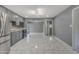 Modern kitchen with gray cabinets, stainless steel appliances, and gray walls at 8132 W Pierson St, Phoenix, AZ 85033