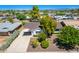 Beautiful aerial view of the home showcasing its well-manicured lawn and landscaping at 8310 E Glenrosa Ave, Scottsdale, AZ 85251