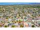 Expansive aerial shot showcasing a charming suburban neighborhood with mountain views at 8310 E Glenrosa Ave, Scottsdale, AZ 85251