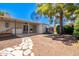 Spacious backyard with covered patio and trampoline, perfect for outdoor fun at 8310 E Glenrosa Ave, Scottsdale, AZ 85251
