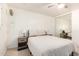 Bright bedroom with a ceiling fan, mirrored closet, and neutral decor at 8310 E Glenrosa Ave, Scottsdale, AZ 85251