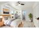 Contemporary bedroom featuring a bed, mini-split AC, and an en-suite kitchen and bathroom at 8310 E Glenrosa Ave, Scottsdale, AZ 85251