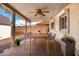 Cozy covered patio with outdoor dining area and view of the backyard at 8310 E Glenrosa Ave, Scottsdale, AZ 85251