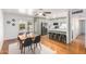 Light and bright dining room situated next to an updated kitchen with stainless steel appliances at 8310 E Glenrosa Ave, Scottsdale, AZ 85251