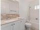 A bathroom featuring a white vanity, a mirror, and a shower over a bathtub at 9436 N 41St Dr, Phoenix, AZ 85051
