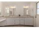 Bright bathroom featuring dual sinks, updated vanity and great natural light at 9436 N 41St Dr, Phoenix, AZ 85051