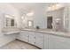 The bathroom features dual sinks and ample counter space for comfortable living at 9436 N 41St Dr, Phoenix, AZ 85051