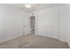Carpeted bedroom offering plenty of storage space and neutral tones at 9436 N 41St Dr, Phoenix, AZ 85051