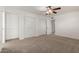 Cozy bedroom with neutral carpet and a closet offers ample storage and comfort at 9436 N 41St Dr, Phoenix, AZ 85051