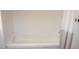 White bathtub and shower space is bright and welcoming at 9501 E Broadway Rd # 254, Mesa, AZ 85208