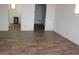 Bedroom featuring neutral walls, white trim, and wood-look flooring at 9501 E Broadway Rd # 254, Mesa, AZ 85208