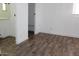 Bright bedroom space with modern wood-look floors and fresh white trim at 9501 E Broadway Rd # 254, Mesa, AZ 85208