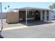 Charming single-Gathering home featuring a covered carport and a well-maintained exterior at 9501 E Broadway Rd # 254, Mesa, AZ 85208