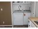 Convenient laundry room featuring a side-by-side washer and dryer at 9501 E Broadway Rd # 254, Mesa, AZ 85208