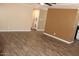 Open-concept living area boasts abundant natural light and modern floors at 9501 E Broadway Rd # 254, Mesa, AZ 85208