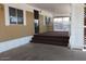 Covered porch with a brown carpeted staircase leading to the front entrance at 9501 E Broadway Rd # 254, Mesa, AZ 85208