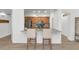 Kitchen with a breakfast bar, seating, and stainless steel appliances at 955 E Knox Rd # 137, Chandler, AZ 85225