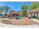 Community playground with colorful equipment and a picnic area, ideal for Gathering fun and gatherings at 955 E Knox Rd # 137, Chandler, AZ 85225