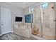 Bathroom features a soaking tub, glass enclosed shower, and decorative painting on the wall at 10841 N Mountain Vista Mtn, Fountain Hills, AZ 85268