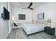 Relaxing bedroom features a queen sized bed, ceiling fan, and decorative artwork at 10841 N Mountain Vista Mtn, Fountain Hills, AZ 85268
