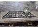 This kitchen features a high-end gas cooktop with stainless steel accents, set against a decorative backsplash at 10841 N Mountain Vista Mtn, Fountain Hills, AZ 85268