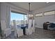 Bright dining room area with a large window, mountain views, and a modern chandelier above the dining table at 10841 N Mountain Vista Mtn, Fountain Hills, AZ 85268