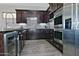 Gourmet kitchen featuring stainless appliances, wood cabinets, and tile backsplash at 10841 N Mountain Vista Mtn, Fountain Hills, AZ 85268