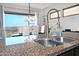 The kitchen sink area is well-lit and appointed with granite counters and dining area with a view at 10841 N Mountain Vista Mtn, Fountain Hills, AZ 85268