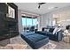 The living room features a dark blue sofa, fireplace, and sliding glass doors to the outside patio at 10841 N Mountain Vista Mtn, Fountain Hills, AZ 85268