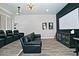Comfortable movie room with a projector screen, cozy seating, and modern lighting at 10841 N Mountain Vista Mtn, Fountain Hills, AZ 85268