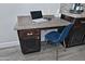 This room features a built-in desk with granite countertops, dark wood cabinets, and a comfortable blue chair at 10841 N Mountain Vista Mtn, Fountain Hills, AZ 85268