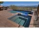 Backyard pool and spa with waterfall feature, brick deck, and stunning mountain views at 10841 N Mountain Vista Mtn, Fountain Hills, AZ 85268