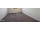 Bedroom featuring neutral color palette, carpeted flooring and a window for natural light at 1091 W West Virginia Ave, Florence, AZ 85132