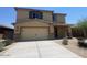 Well maintained two-story house with a two-car garage and low maintenance desert landscaping at 1091 W West Virginia Ave, Florence, AZ 85132